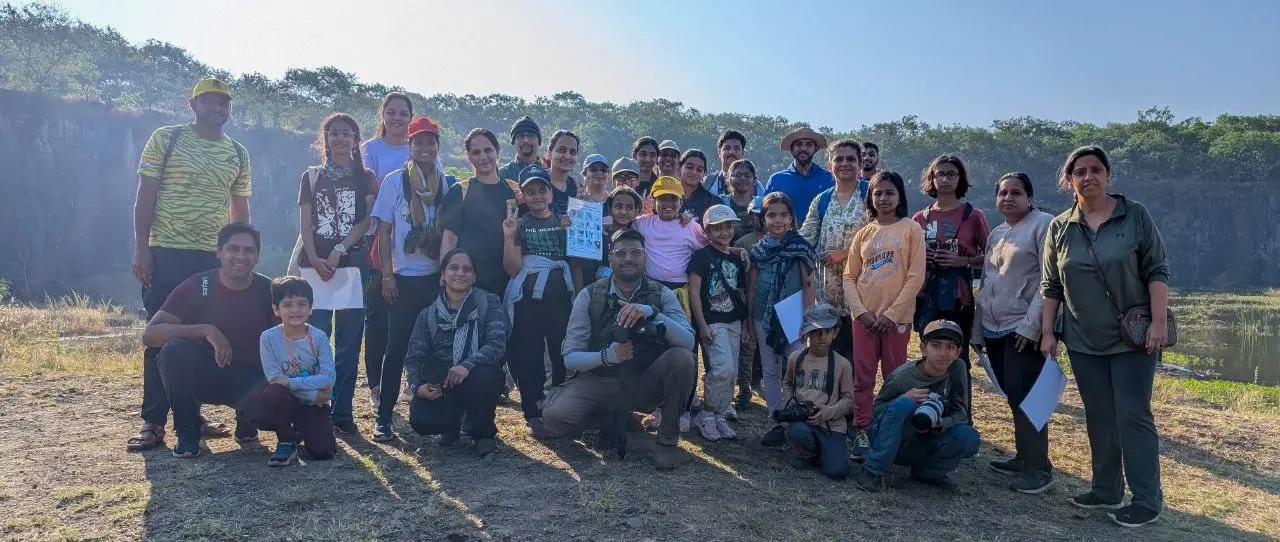 Group of young birders and volunteers on Vetal Tekdi